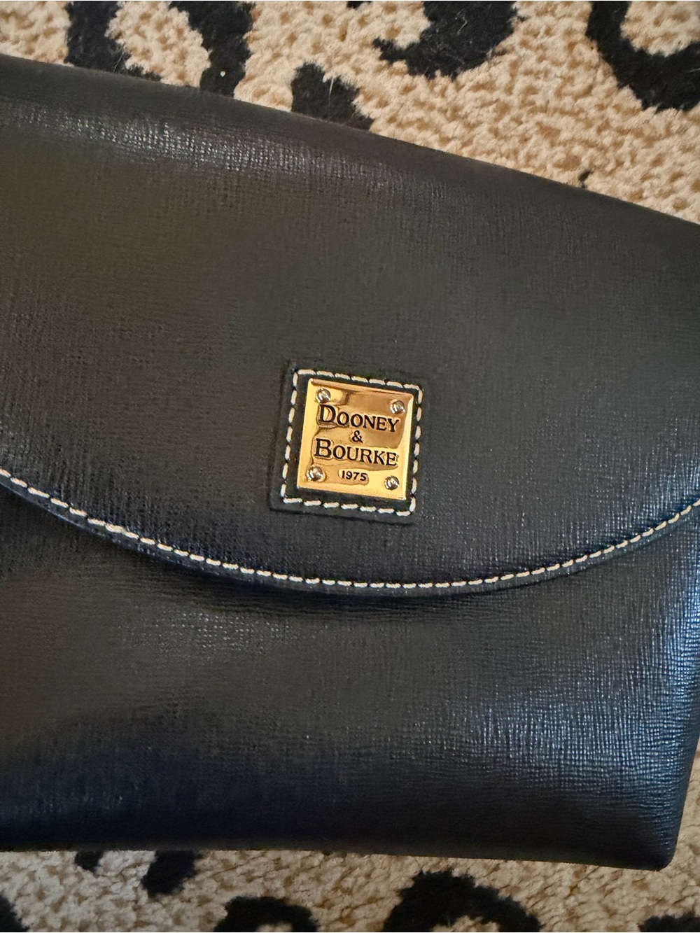 Dooney & Bourke Black Leather Crossbody Bag with Gold Logo Plaque